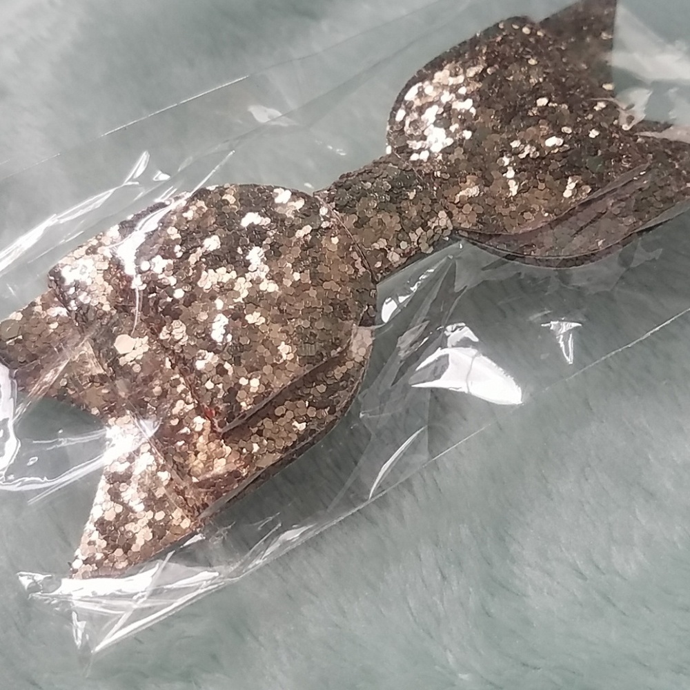 Gold sparkle little toddler bow